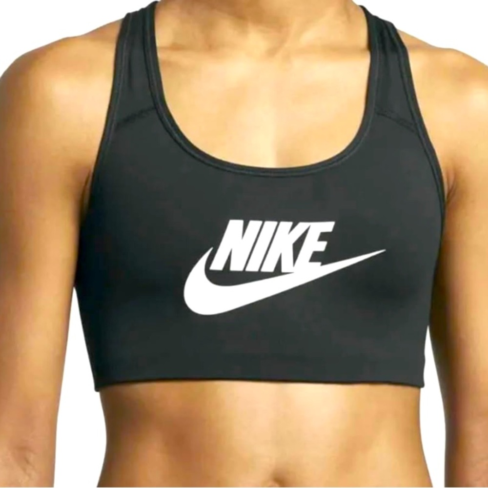 Pink and white Nike sports bra